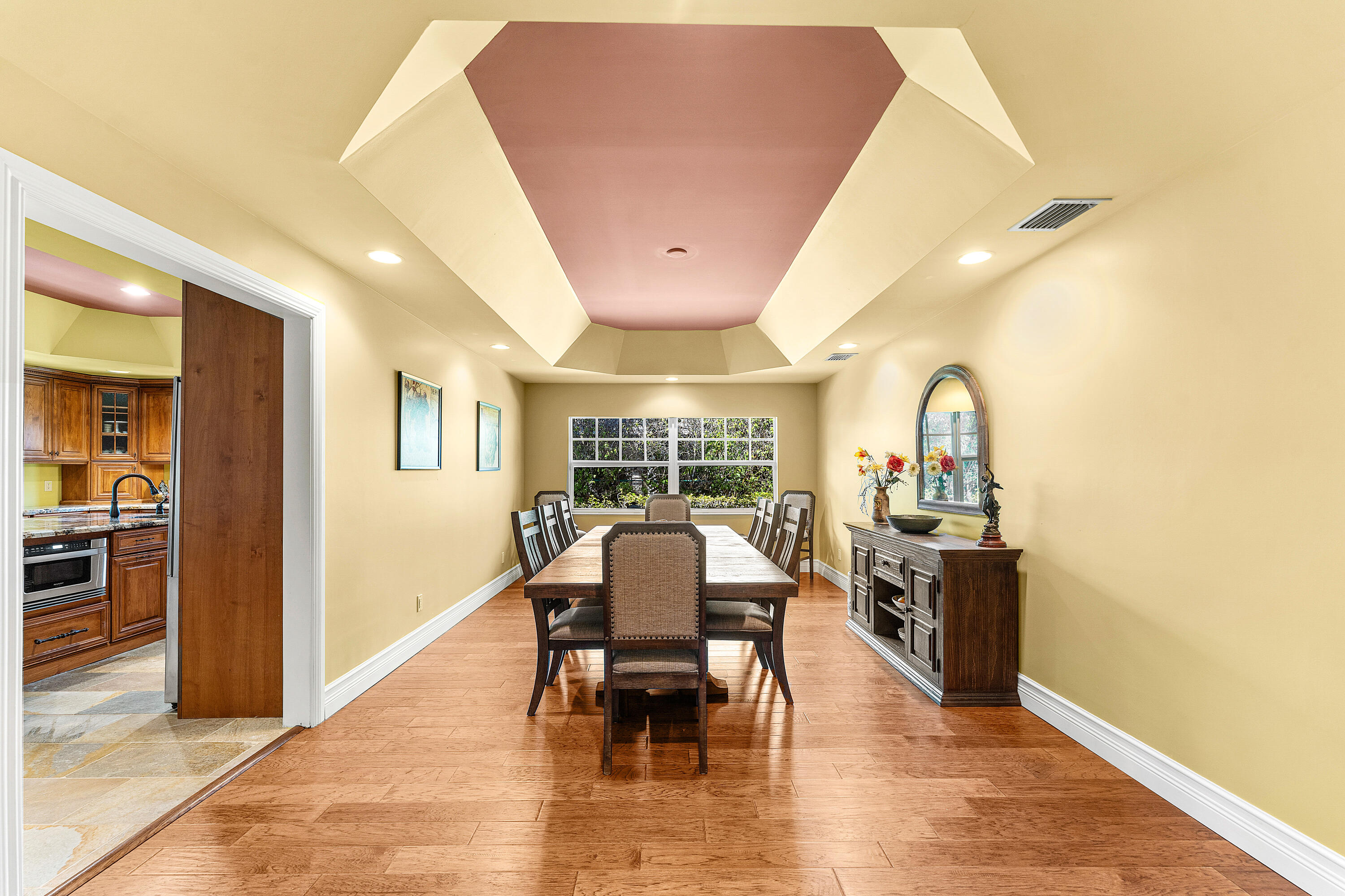 10295 St Andrews Road Boynton Beach, FL 33436 - Photo 11 of 43 a dining room with furniture and wooden floor