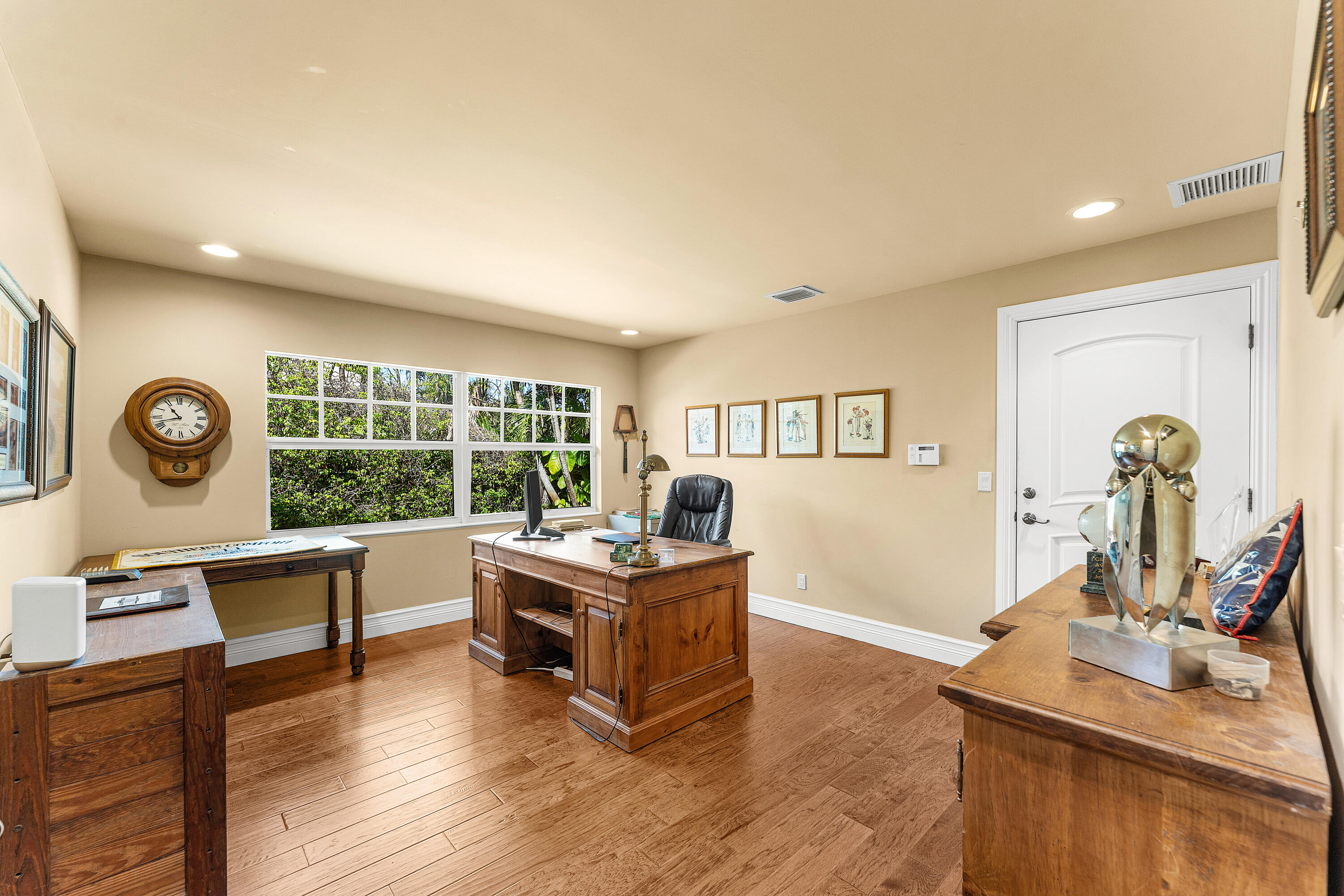 10295 St Andrews Road Boynton Beach, FL 33436 - Photo 12 of 43 a living room with furniture and a wooden floor