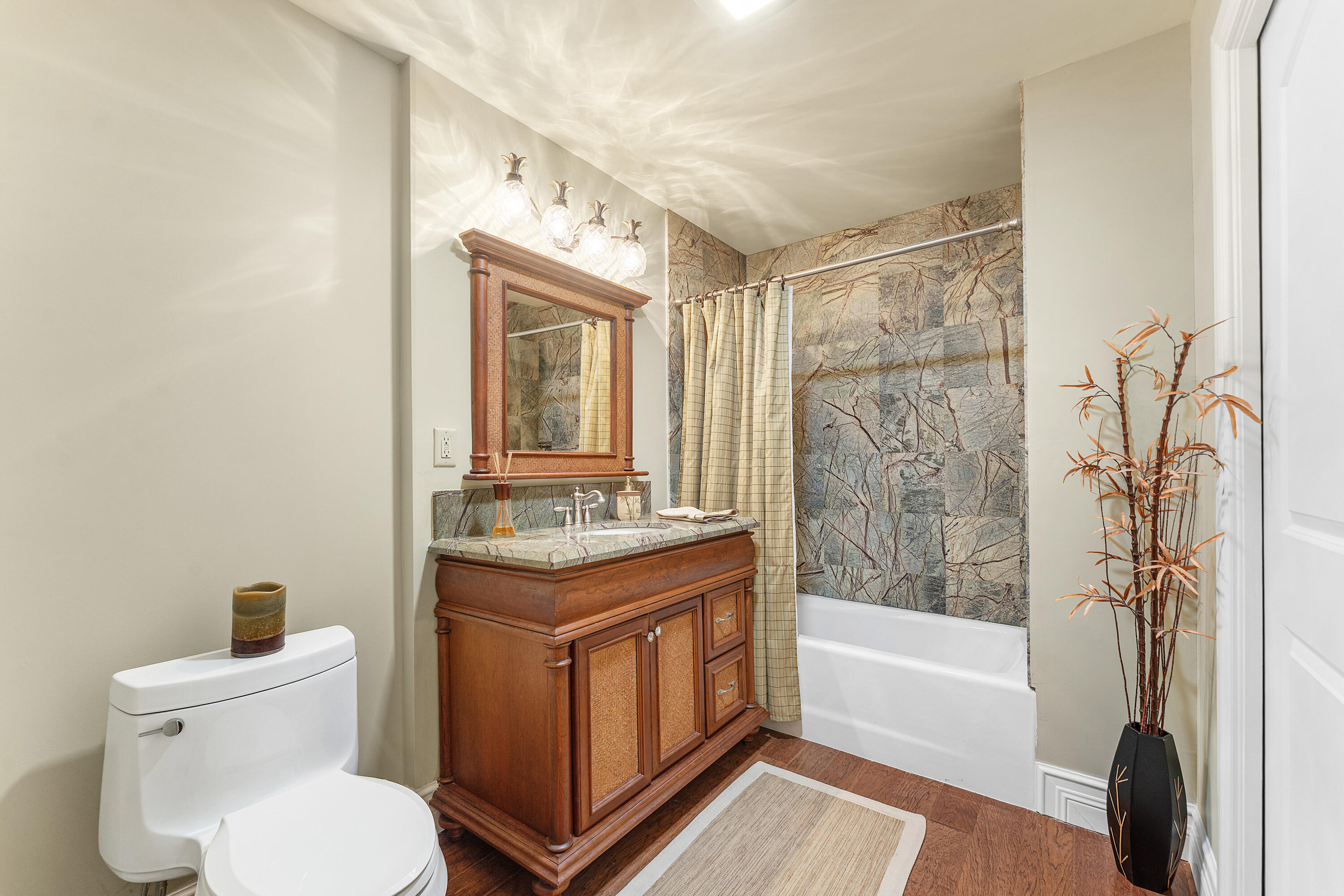 10295 St Andrews Road Boynton Beach, FL 33436 - Photo 14 of 43 a bathroom with a granite countertop sink toilet and shower