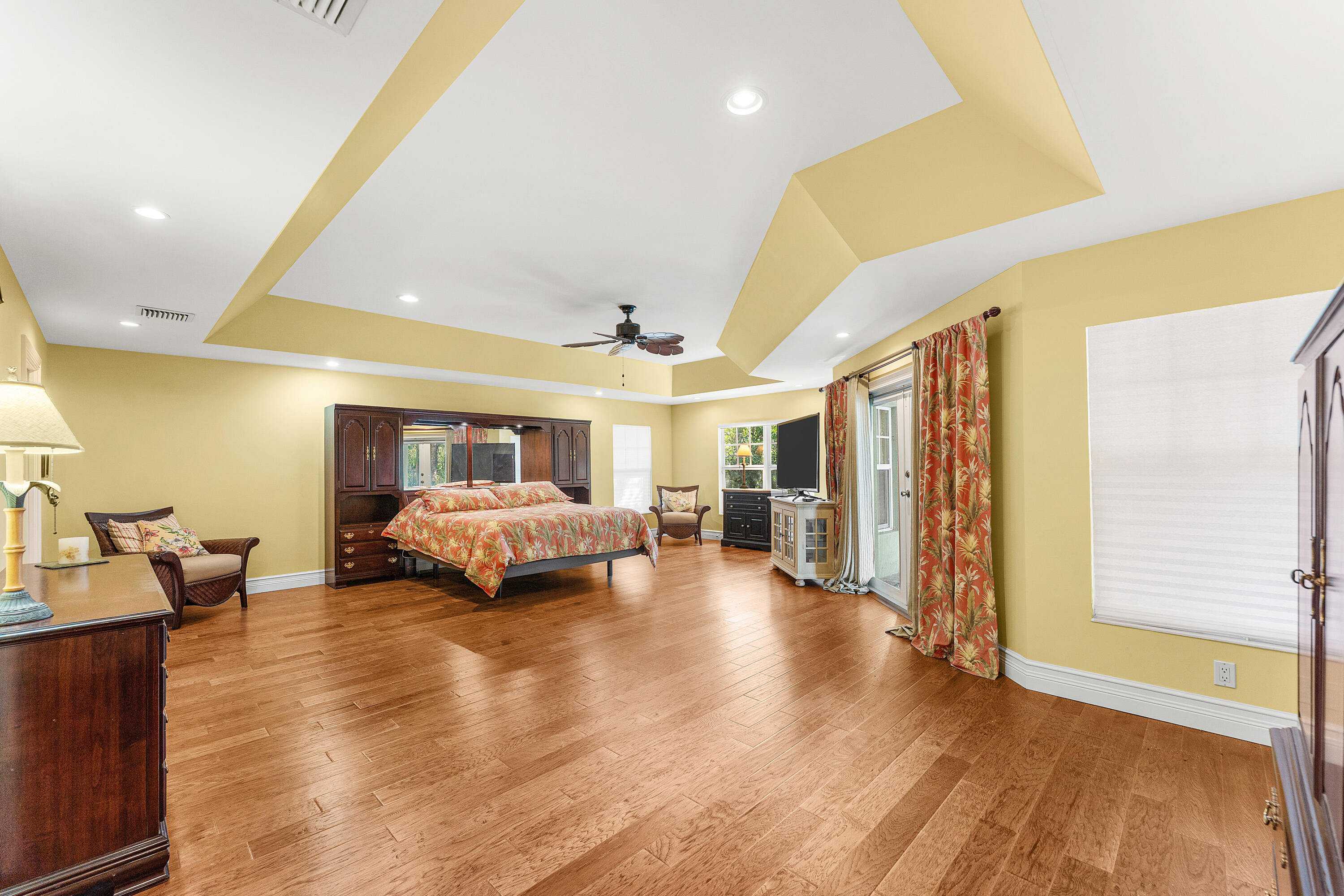 10295 St Andrews Road Boynton Beach, FL 33436 - Photo 16 of 43 a living room with furniture and a wooden floor