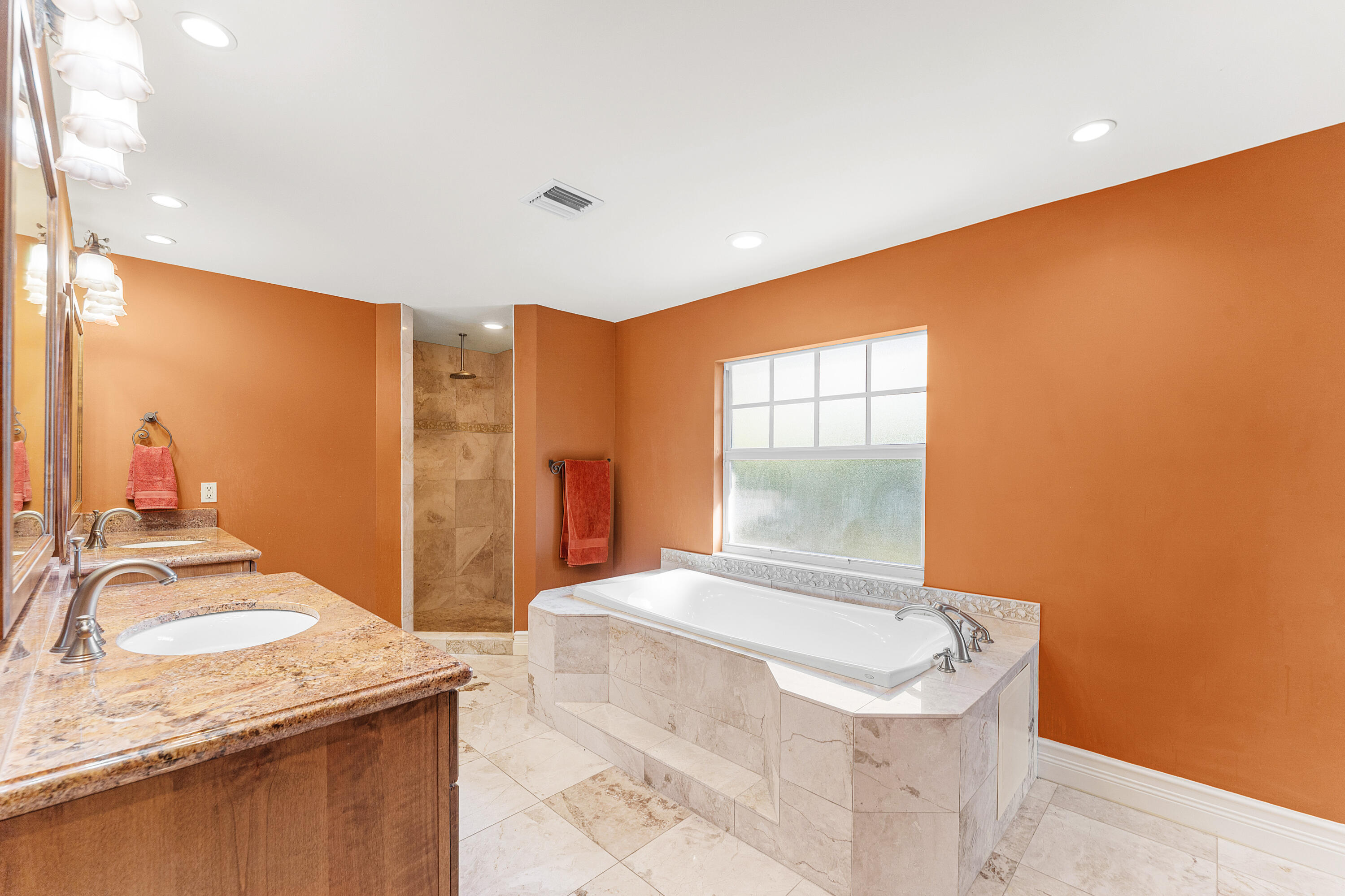 10295 St Andrews Road Boynton Beach, FL 33436 - Photo 19 of 43 a bathroom with a granite countertop sink and a mirror