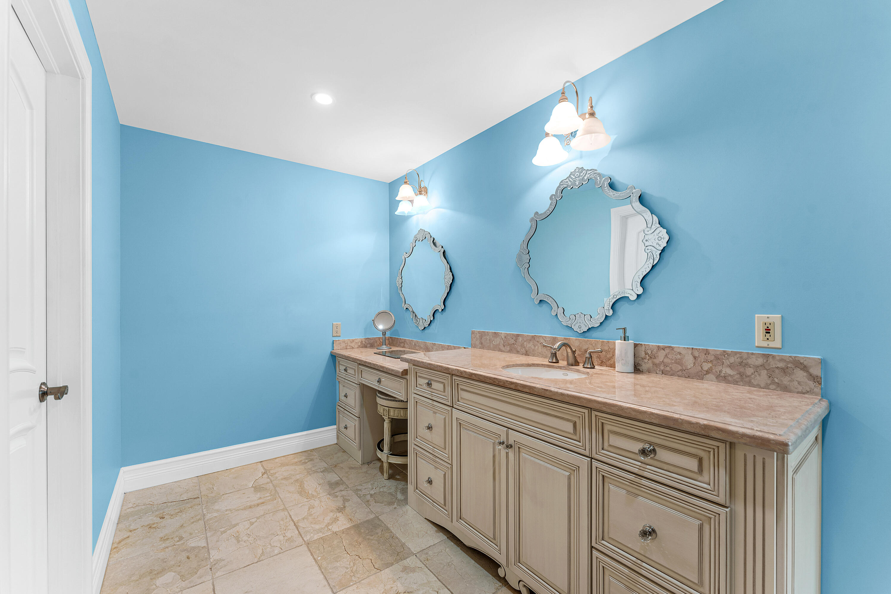 10295 St Andrews Road Boynton Beach, FL 33436 - Photo 27 of 43 a bathroom with a sink vanity and mirror