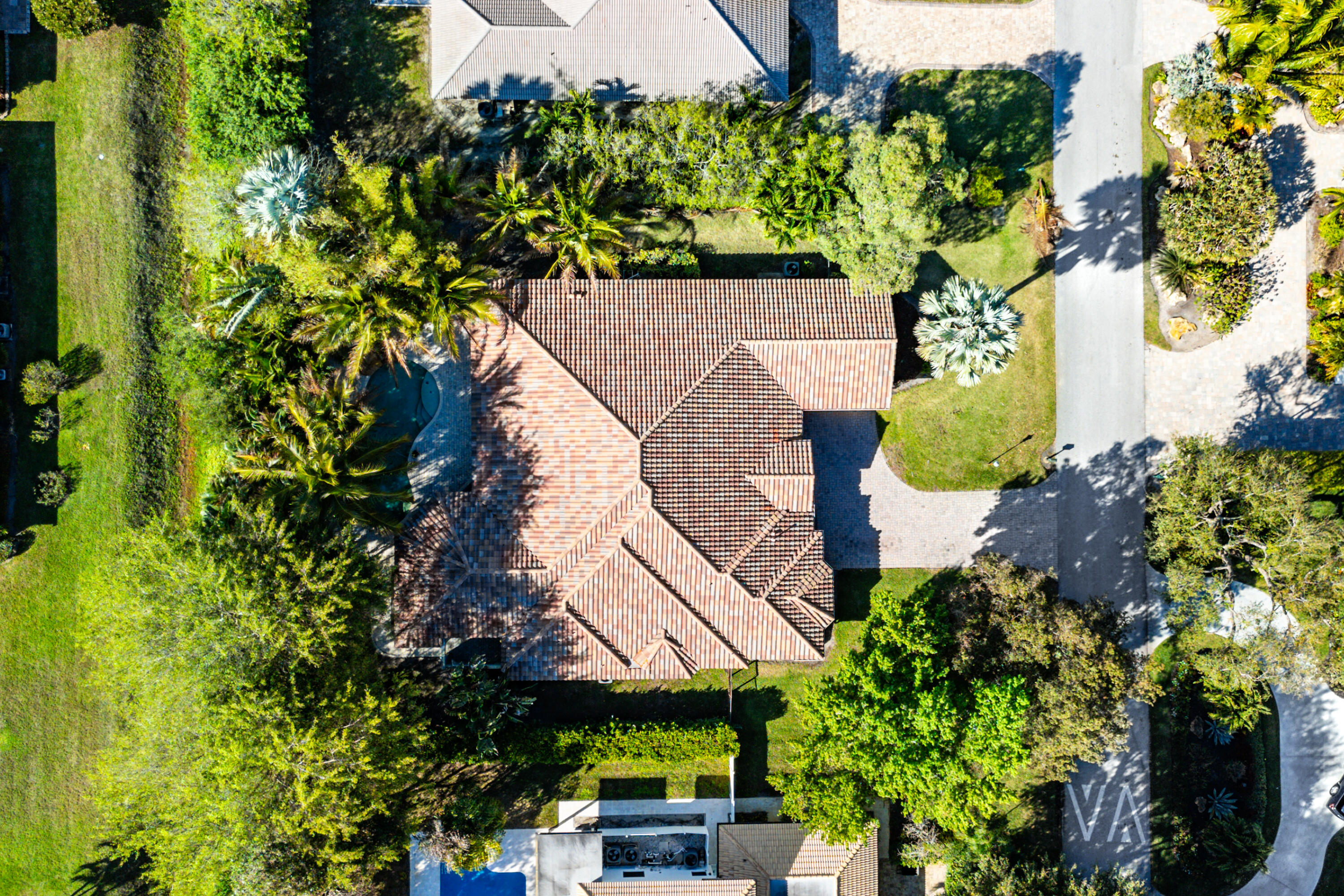 10295 St Andrews Road Boynton Beach, FL 33436 - Photo 41 of 43 an aerial view of a house with a yard and garden