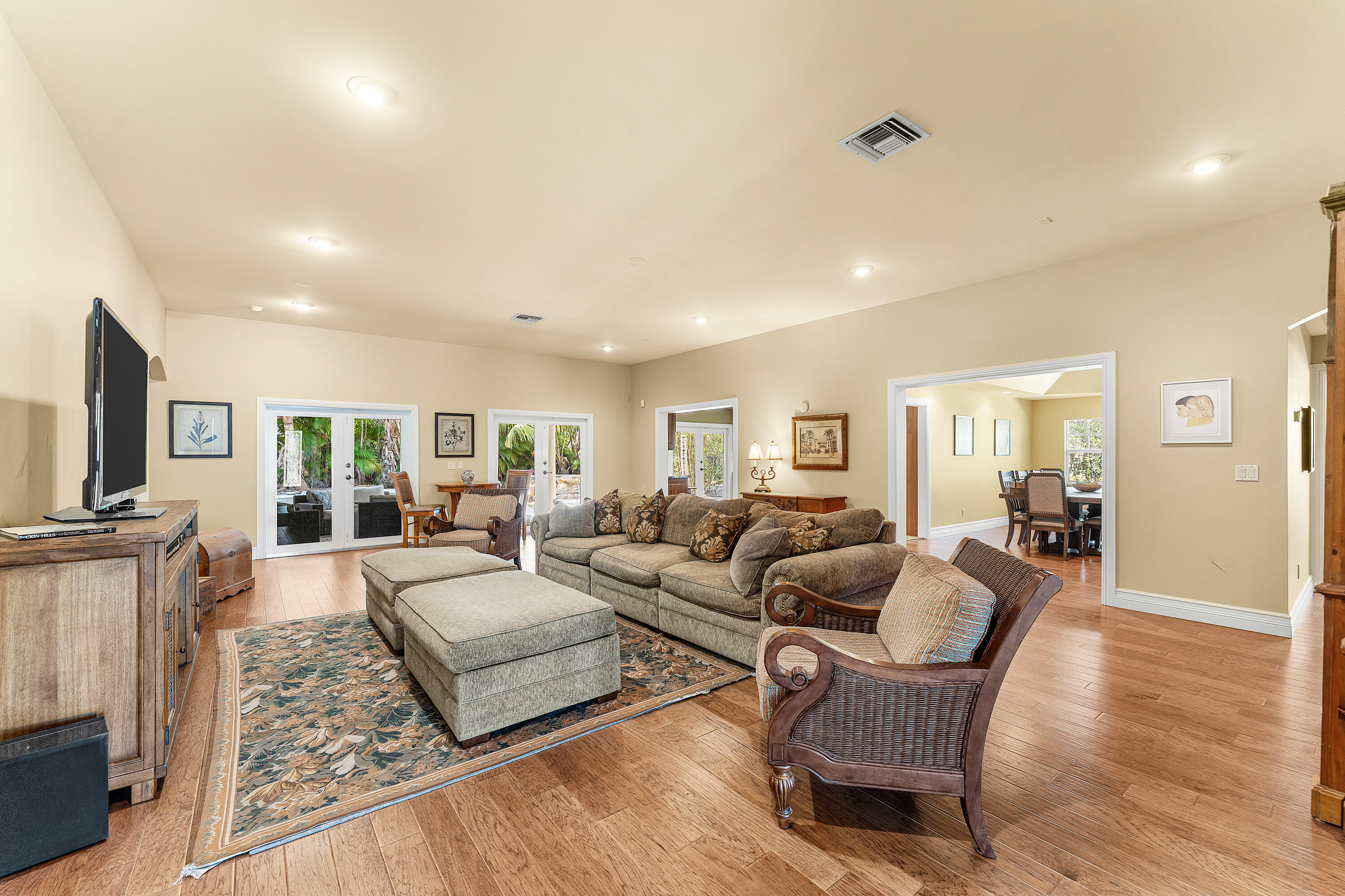 10295 St Andrews Road Boynton Beach, FL 33436 - Photo 5 of 43 a living room with fireplace furniture and a flat screen tv