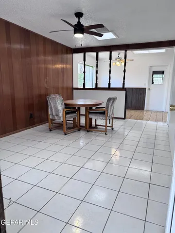 a bedroom with furniture and window