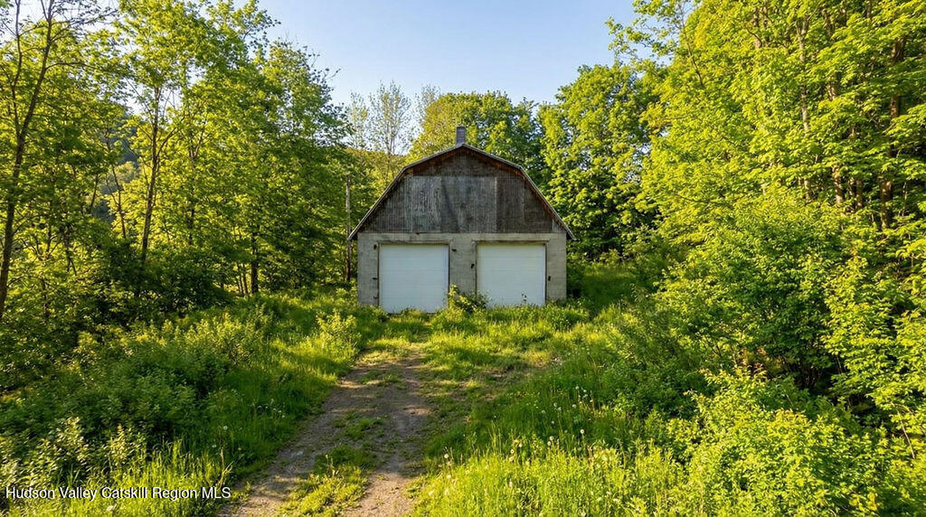 30 Harter Road West Kill, NY 12492 - Photo 23 of 32 a house view with a backyard space