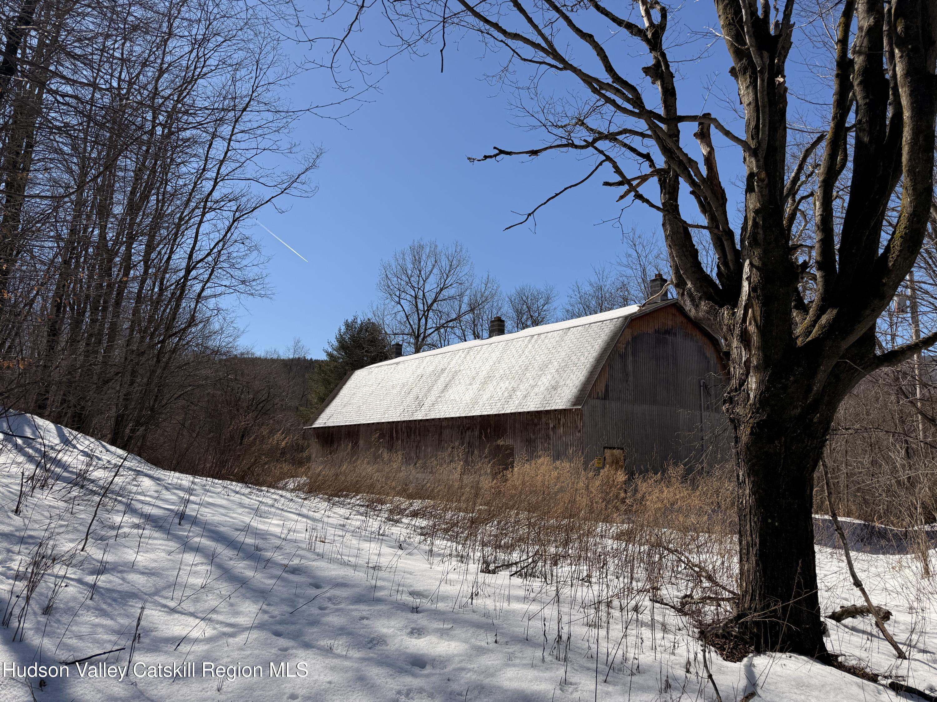 30 Harter Road West Kill, NY 12492 - Photo 10 of 32 a view of a wooden bridge with large trees