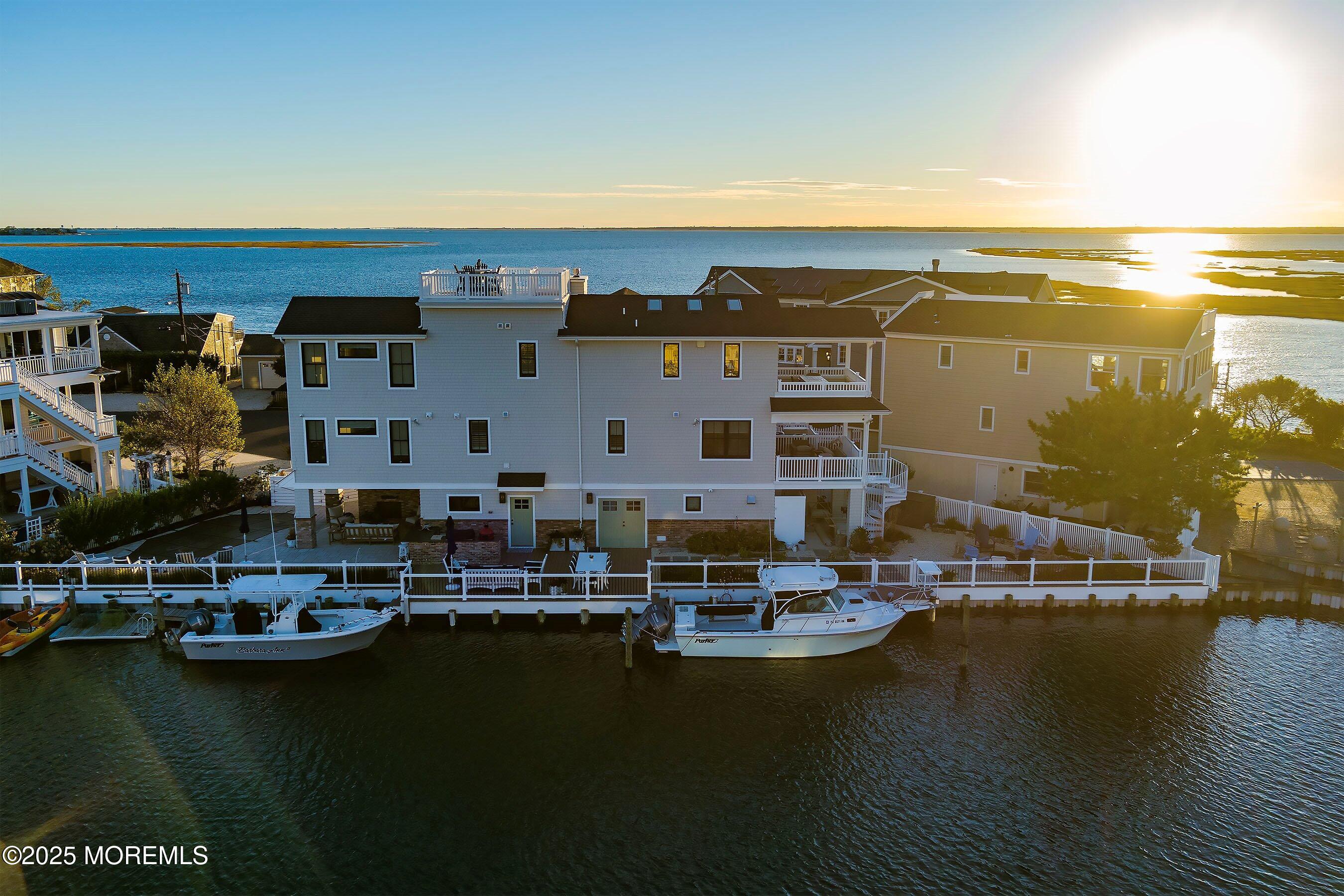 46 Adrian Road Barnegat Light, NJ 08006 - Photo 22 of 28 a view of ocean with building