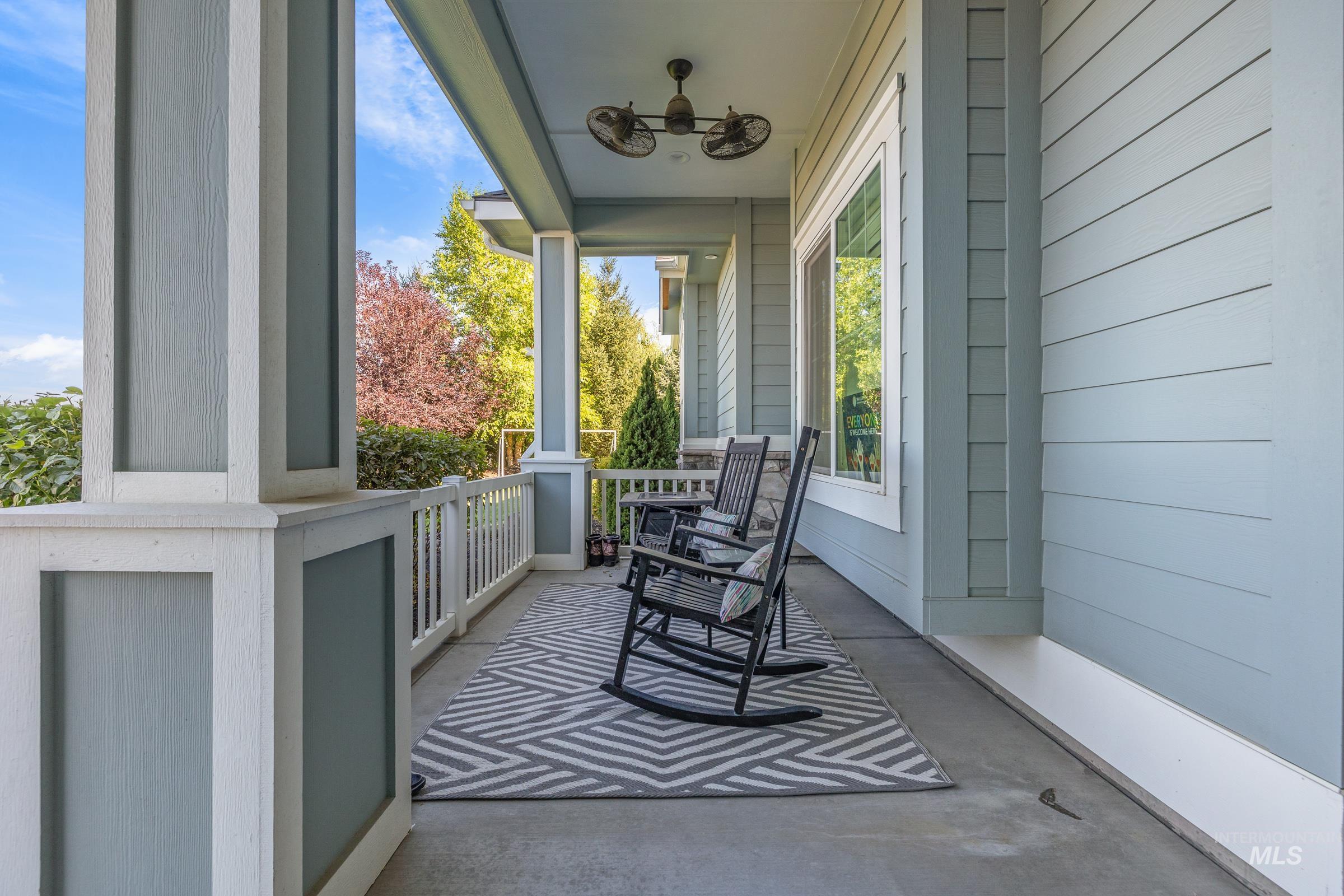 5744 North Star Ridge Way Star, ID 83669 - Photo 5 of 50 Covered porch with concrete flooring and a ceiling fan