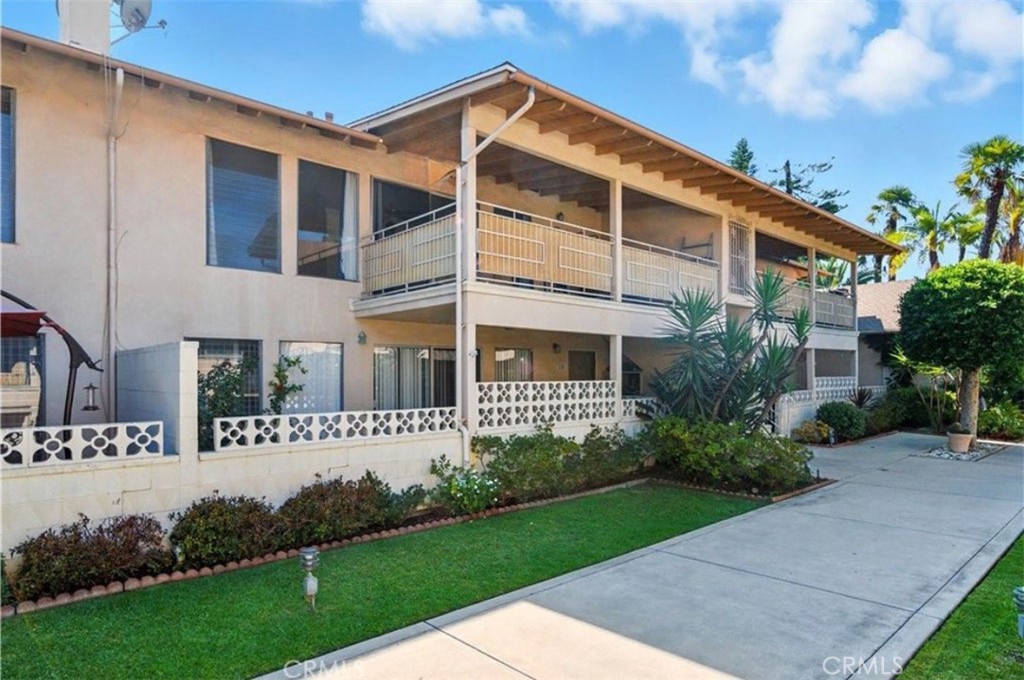 471 West Duarte Road, Unit 216 Arcadia, CA 91007 - Photo 16 of 18 a front view of a house with a yard