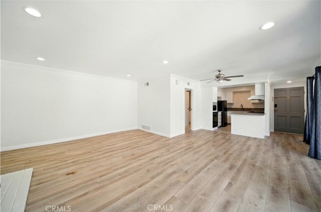 471 West Duarte Road, Unit 216 Arcadia, CA 91007 - Photo 2 of 18 a view of a kitchen with a refrigerator and a sink