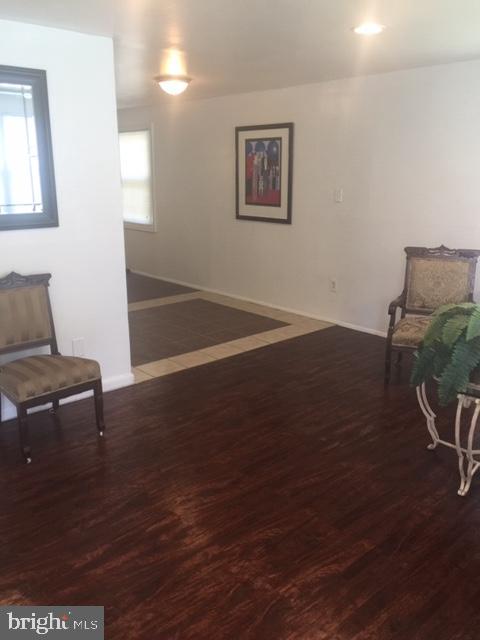 7616 Burnside Road Landover, MD 20785 - Photo 18 of 20 LIVING ROOM INTO DINING ROOM