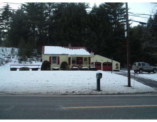 39 Stafford Road Monson, MA 01057 - Photo 1 of 1 a front view of a house with garden
