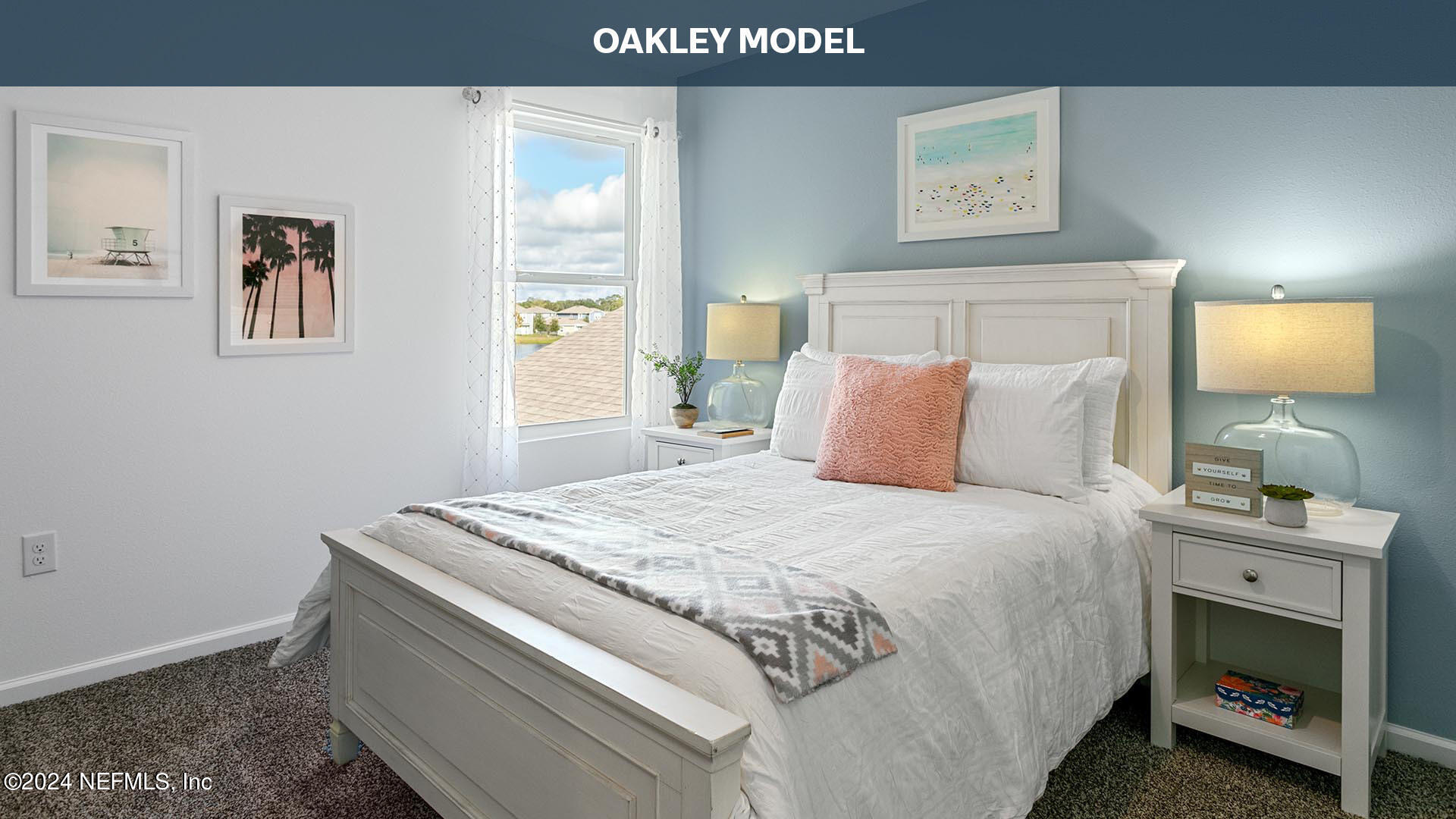 9249 Stony Brook Road Jacksonville, FL 32256 - Photo 13 of 34 a bedroom with a bed and a lamp