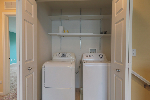 1240 Mariemont Road, Unit E Sugar Grove, IL 60554 - Photo 21 of 32 a utility room with dryer and washer
