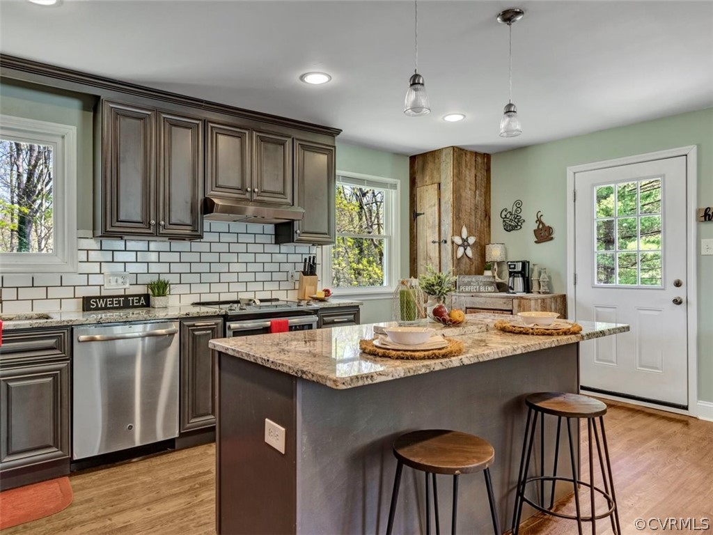 5331 Carteret Road Chesterfield, VA 23832 - Photo 12 of 27 a kitchen with a sink stove and cabinets