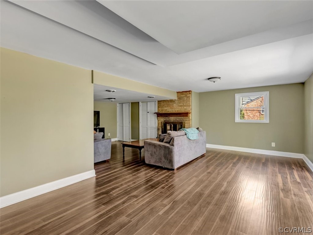 5331 Carteret Road Chesterfield, VA 23832 - Photo 23 of 27 a living room with furniture and a wooden floor