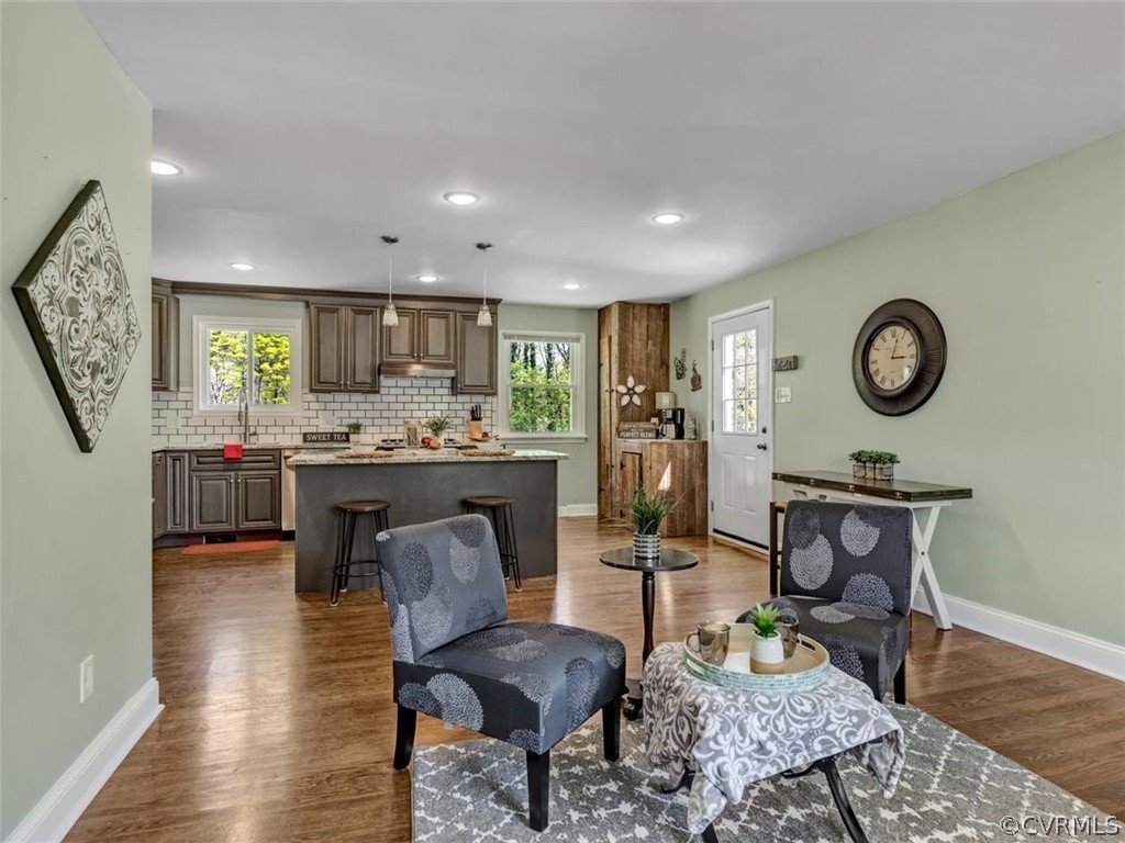 5331 Carteret Road Chesterfield, VA 23832 - Photo 7 of 27 a living room with kitchen furniture and a wooden floor