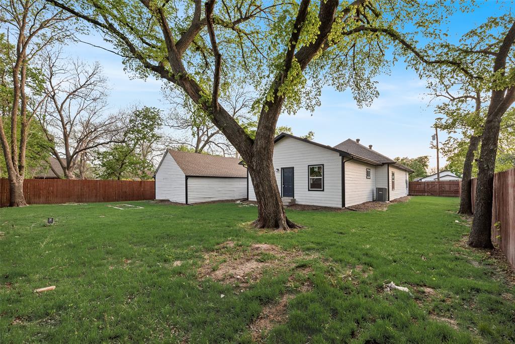 1014 Trinity Street Cleburne, TX 76031 - Photo 19 of 24 a house view with a garden