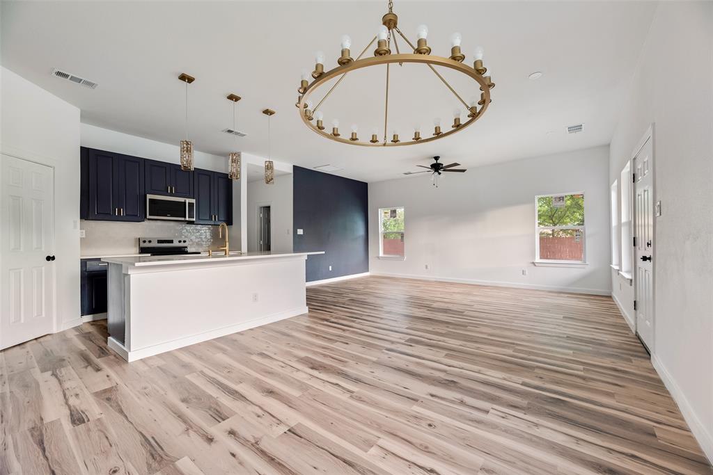 1014 Trinity Street Cleburne, TX 76031 - Photo 23 of 24 a view of kitchen and microwave