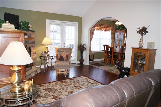 518 Dorris Road Portland, TN 37148 - Photo 14 of 20 The living room has 2 french doors that lead the deck which also provides seasonal dining amd living space.