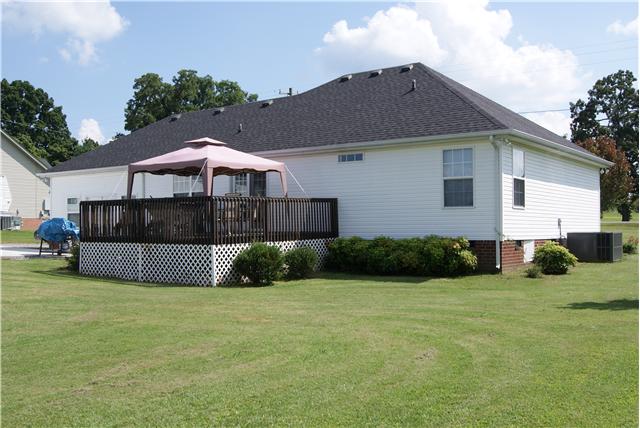 518 Dorris Road Portland, TN 37148 - Photo 17 of 20 Here is a view of the deck and patio area off the back of the home.