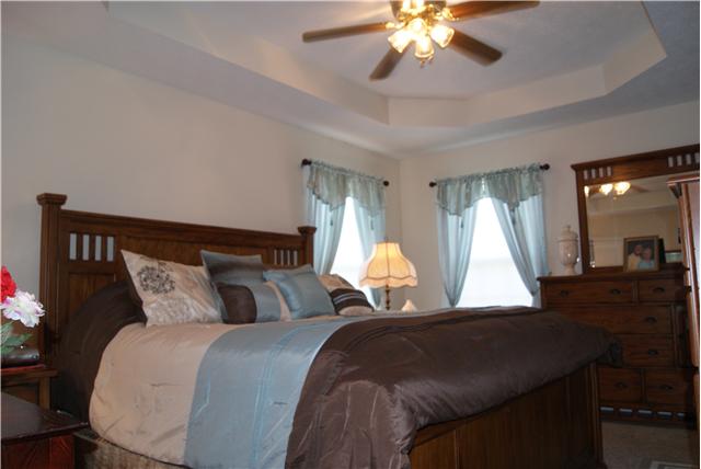 518 Dorris Road Portland, TN 37148 - Photo 8 of 20 The master bedroom easily accommodates a king-sized bed and additional bedroom furniture. The master bedroom also has its own full bath.
