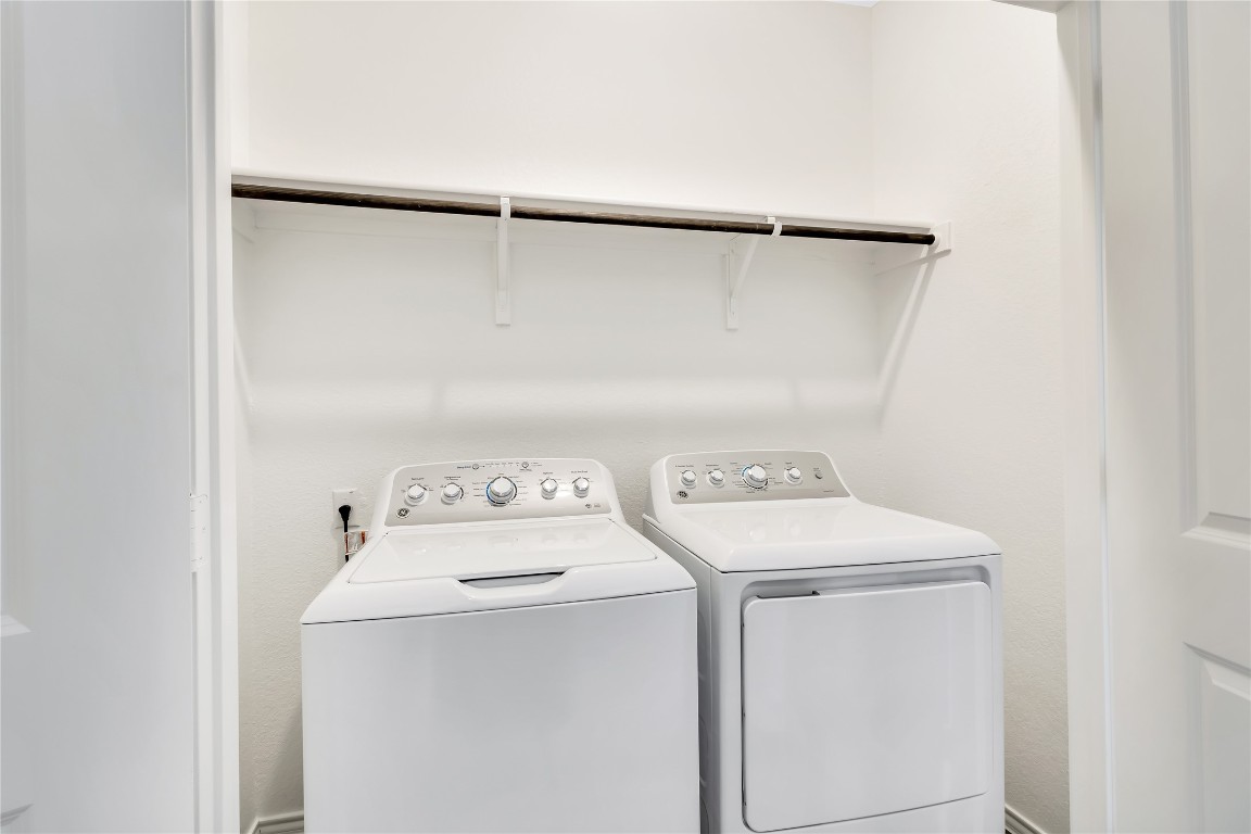 160 The Bad Way Jarrell, TX 76537 - Photo 19 of 33 Washroom with washing machine and dryer