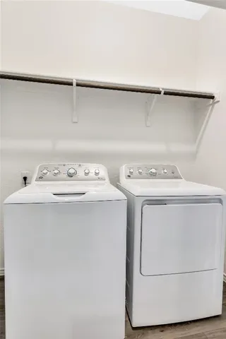 a utility room with dryer and washer