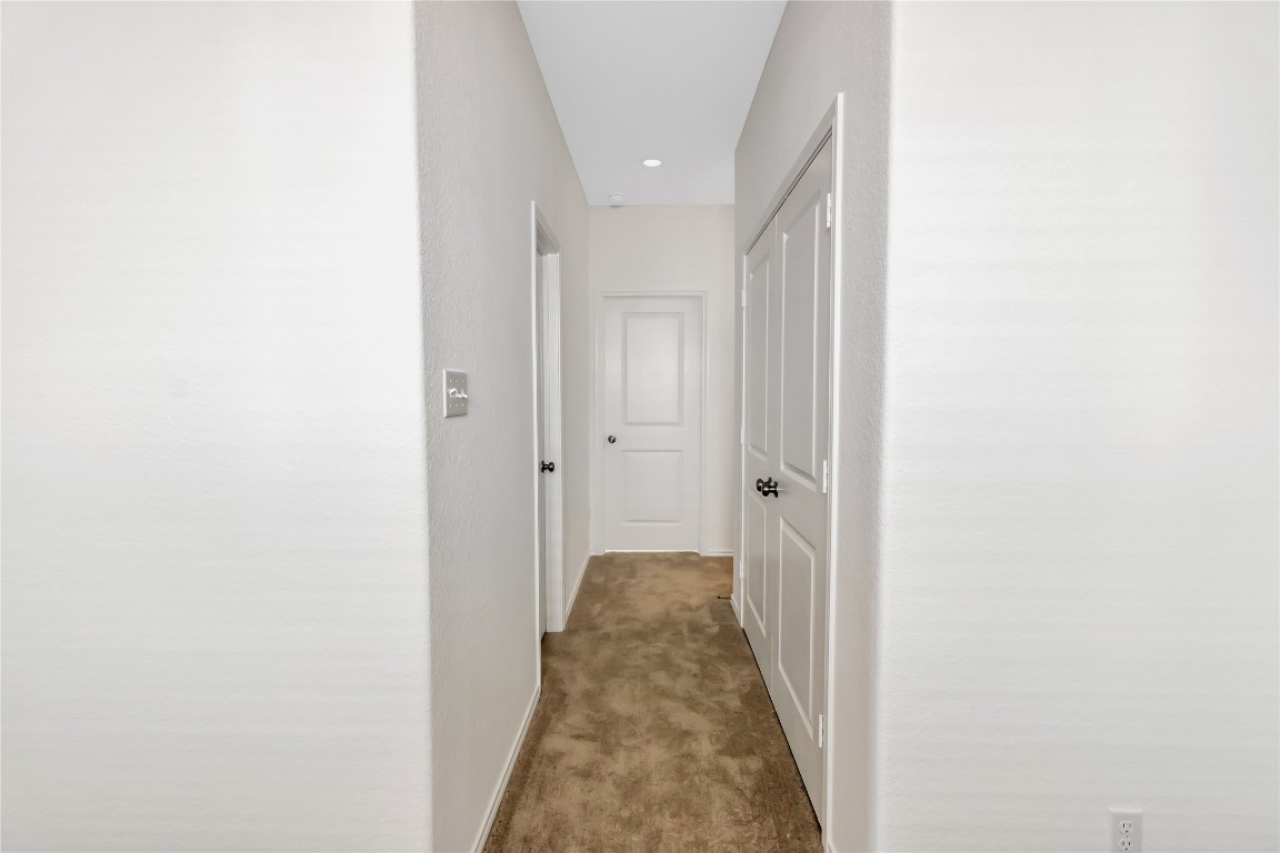 160 The Bad Way Jarrell, TX 76537 - Photo 5 of 33 Hall with carpet flooring and baseboards