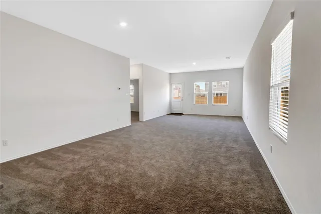 a view of a livingroom with a staircase