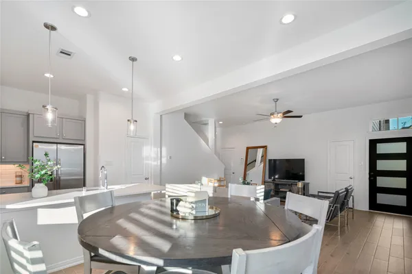 a view of a dining room with furniture
