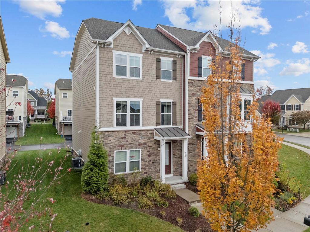 818 Oneida Circle Mars, PA 16046 - Photo 2 of 45 a front view of a house with a yard