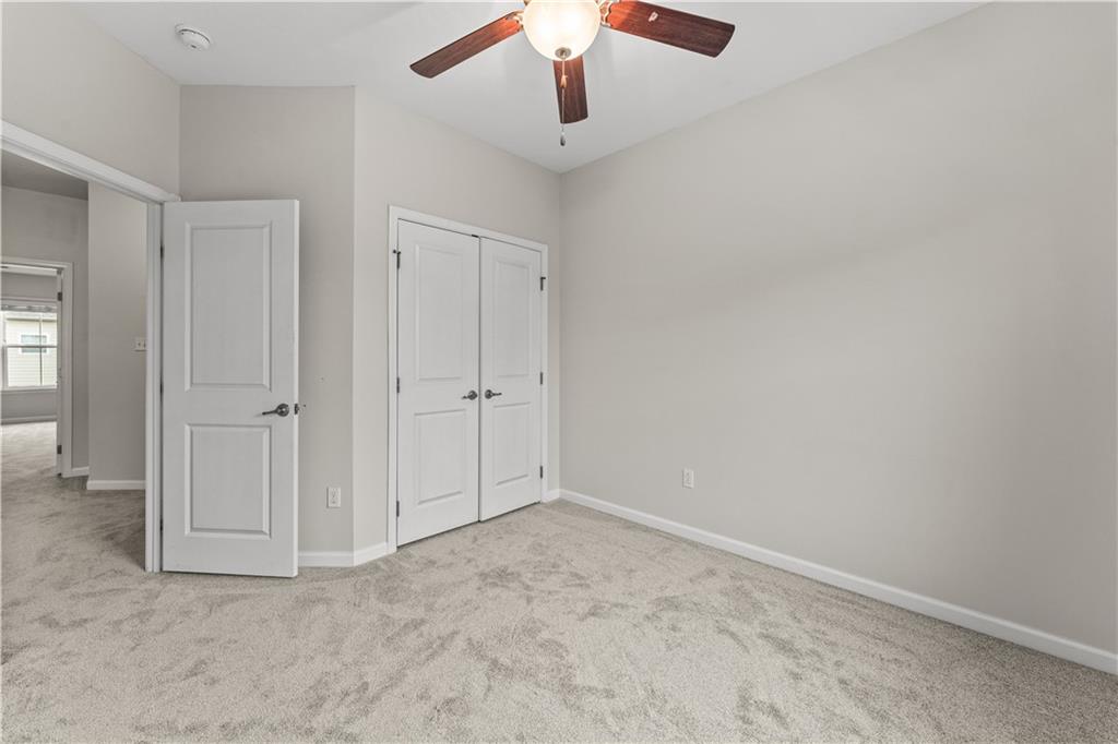 818 Oneida Circle Mars, PA 16046 - Photo 25 of 45 a view of an empty room and chandelier fan