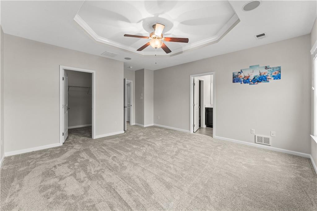 818 Oneida Circle Mars, PA 16046 - Photo 27 of 45 a view of an empty room with a ceiling fan