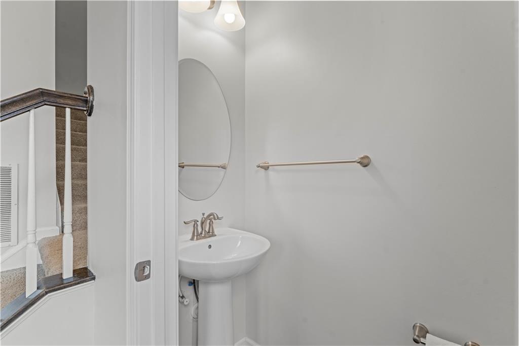 818 Oneida Circle Mars, PA 16046 - Photo 30 of 45 a bathroom with a sink and mirror