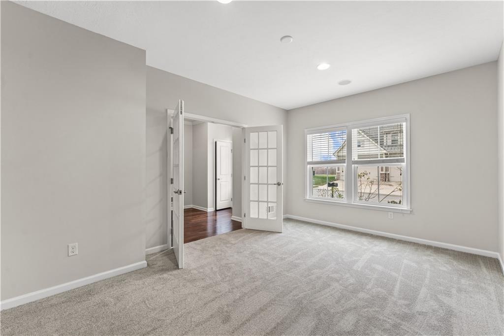 818 Oneida Circle Mars, PA 16046 - Photo 4 of 45 a view of an empty room with a window
