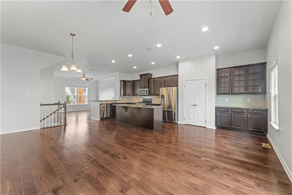 818 Oneida Circle Mars, PA 16046 - Photo 7 of 45 a kitchen with stainless steel appliances a refrigerator sink and cabinets