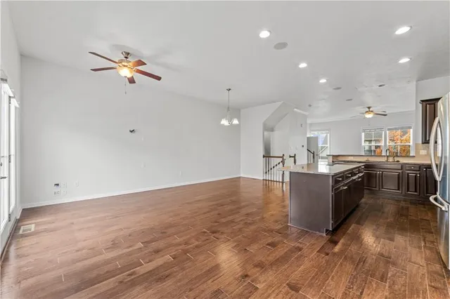 a view of kitchen with wooden floor