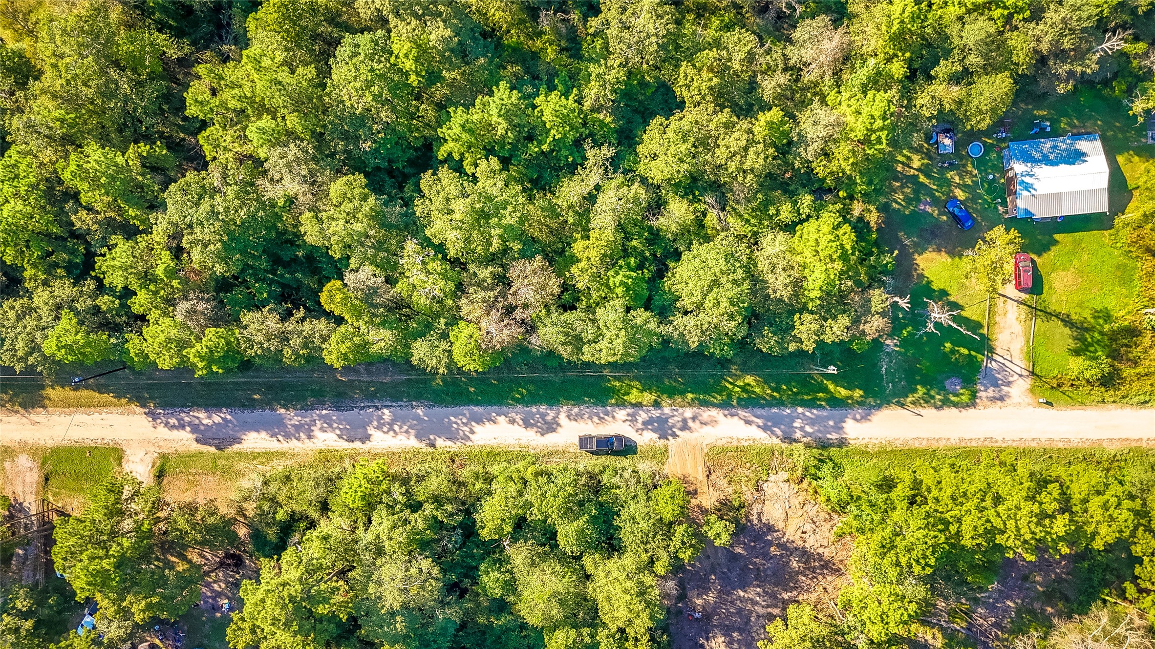 28 Timbergrove Livingston, TX 77351 - Photo 8 of 8 a view of a lake with an outdoor space