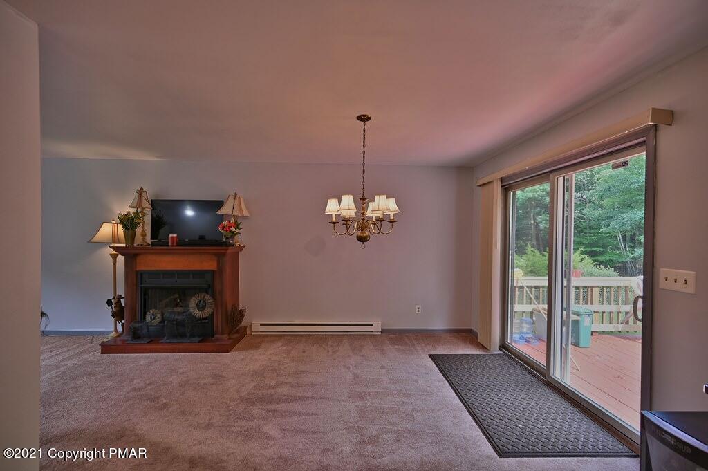 273 Devils Hole Road Cresco, PA 18326 - Photo 24 of 59 a living room with furniture and a fireplace
