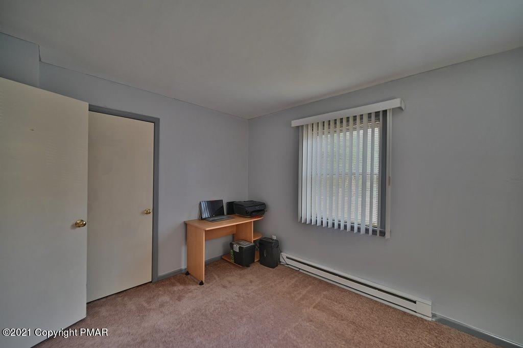 273 Devils Hole Road Cresco, PA 18326 - Photo 26 of 59 an empty room with windows