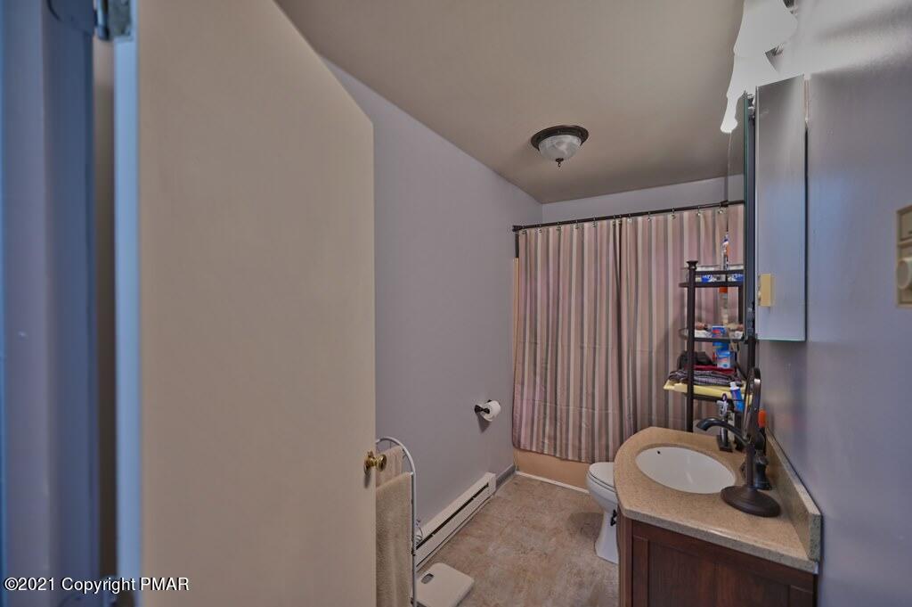 273 Devils Hole Road Cresco, PA 18326 - Photo 29 of 59 a bathroom with a sink and a mirror