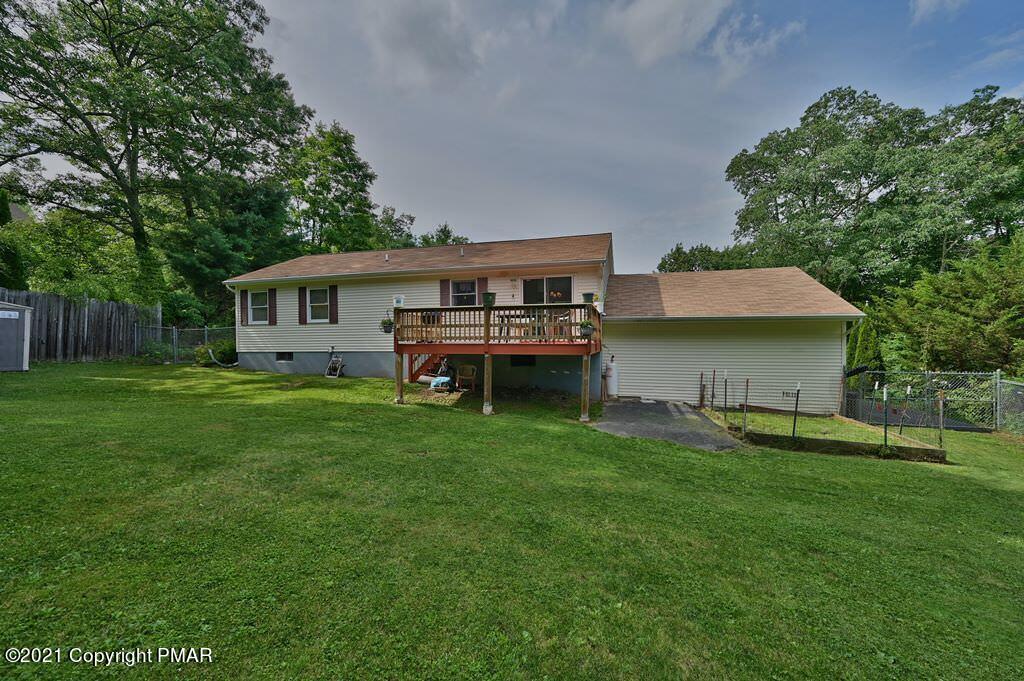 273 Devils Hole Road Cresco, PA 18326 - Photo 45 of 59 a view of a house with a backyard