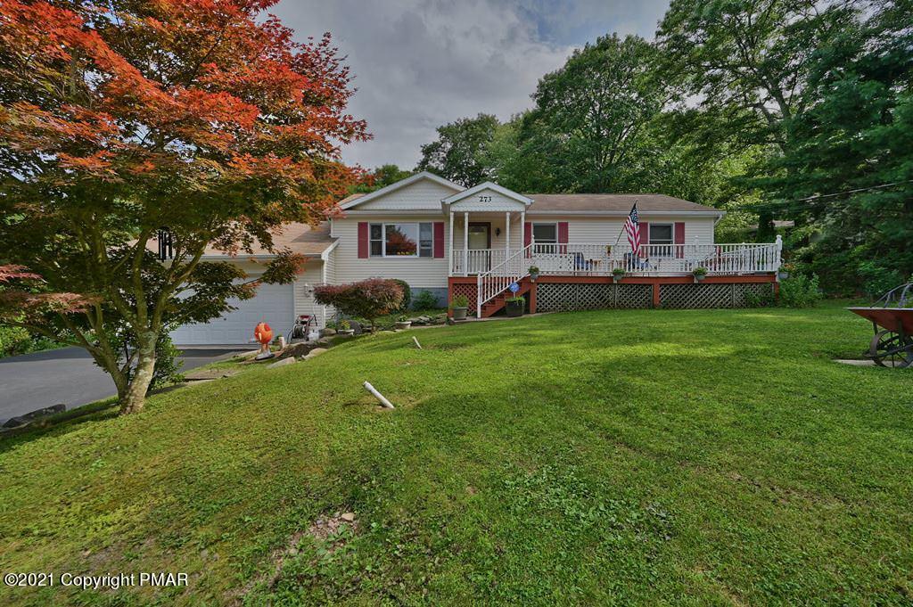 273 Devils Hole Road Cresco, PA 18326 - Photo 48 of 59 a front view of a house with garden