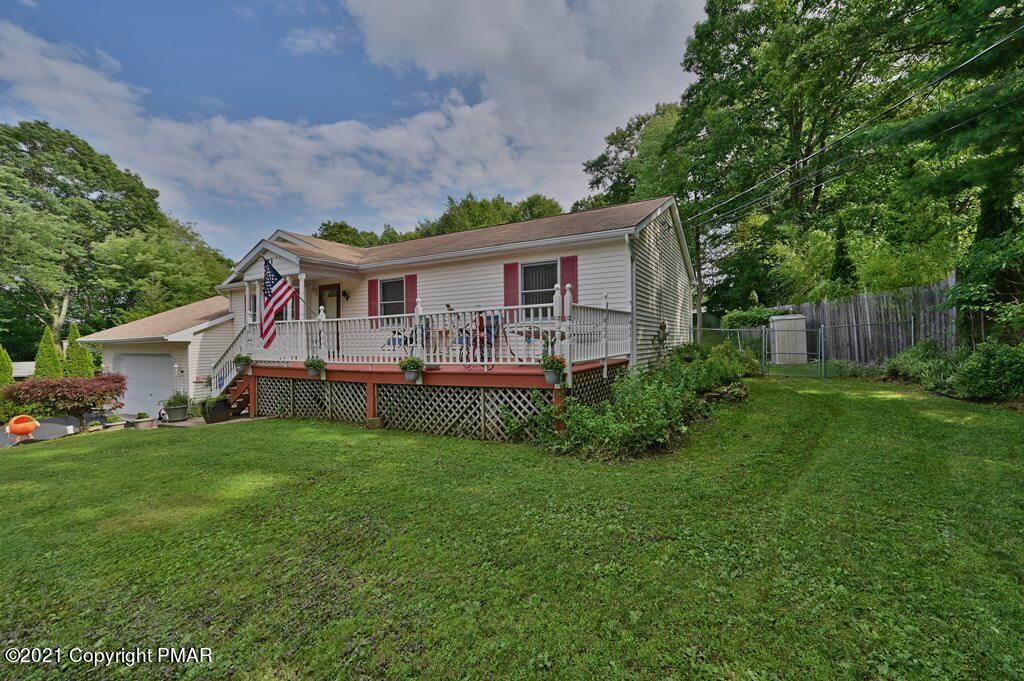 273 Devils Hole Road Cresco, PA 18326 - Photo 5 of 59 a view of a house with a big yard plants and large trees