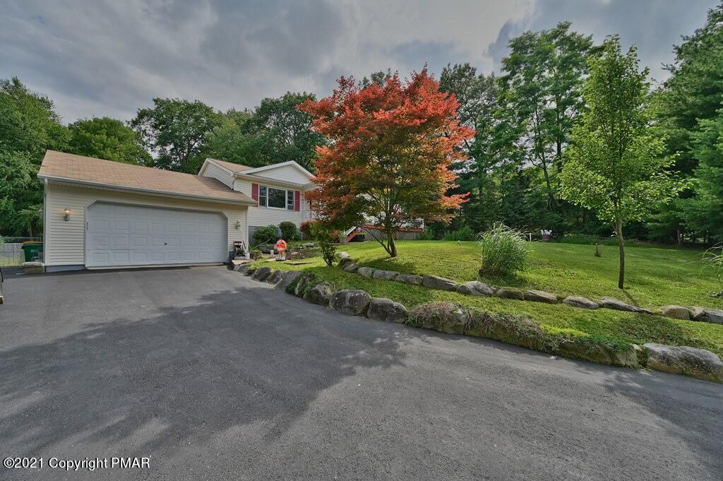 273 Devils Hole Road Cresco, PA 18326 - Photo 56 of 59 a house view with a garden space