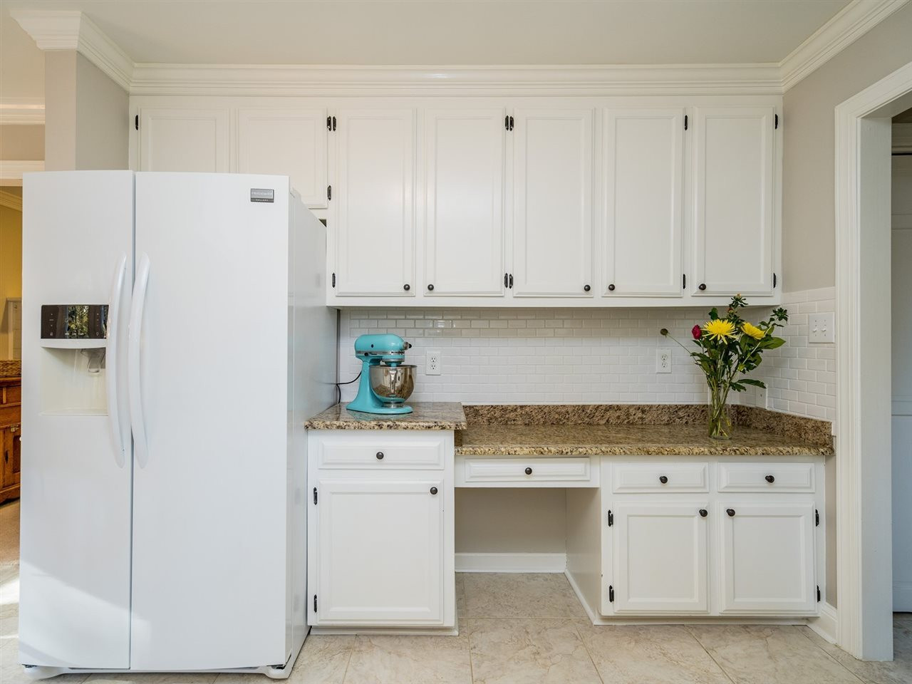 8508 Council Court Raleigh, NC 27615 - Photo 14 of 27 The built-in desk in the kitchen is always a plus. Kitchen