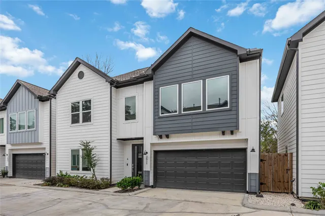 a house view with a small garden