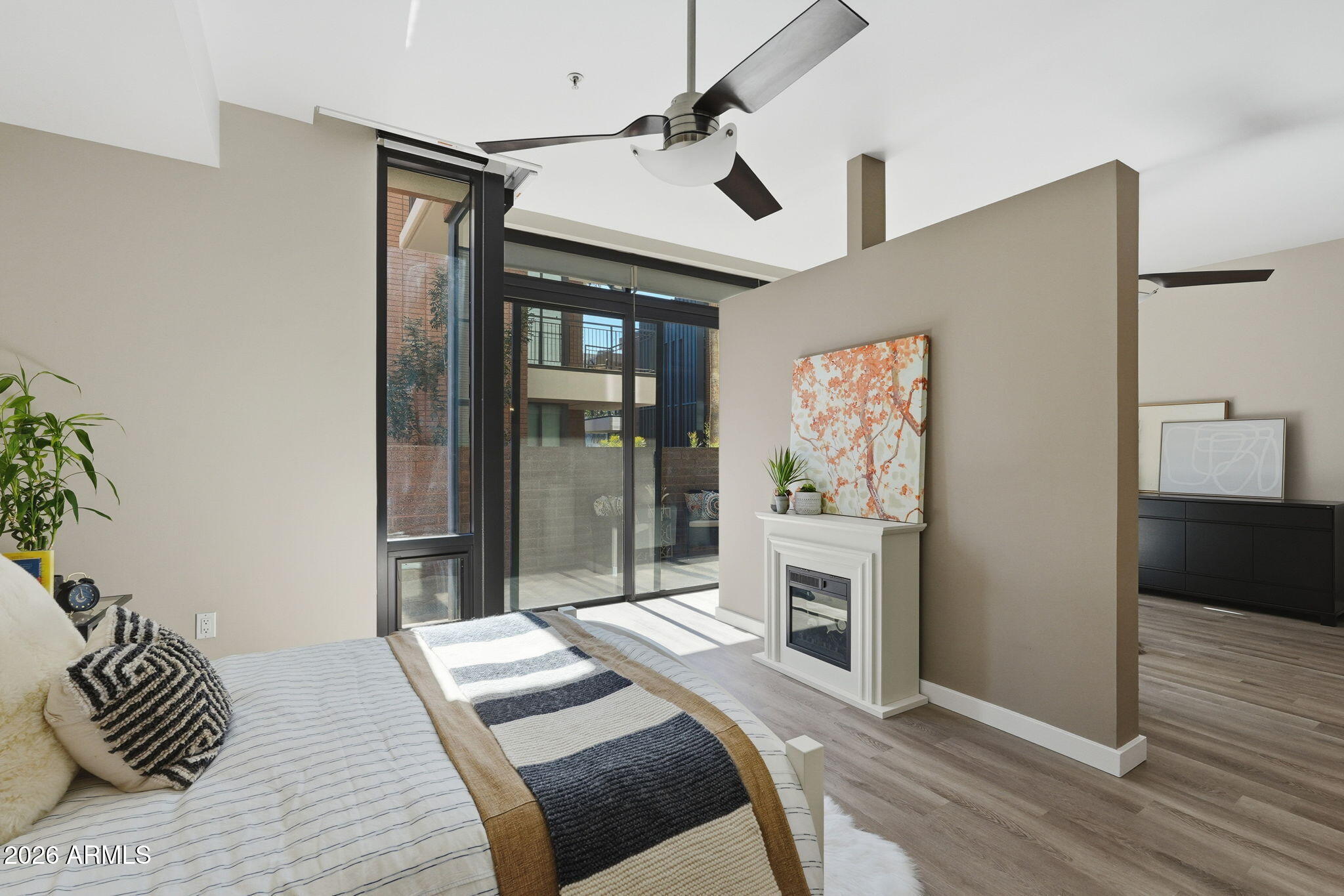 208 West Portland Street, Unit 155 Phoenix, AZ 85003 - Photo 11 of 36 a bedroom with a bed and a walk in closet